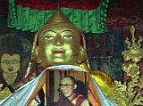 Tibet Lhasa 02 11 Jokhang Inside Tsongkhapa Tsongkhapa (1357-1419) wears the yellow hat of the Gelugpa order, which he founded and now has the Dalai Lama at its head. He is supposedly a manifestation of Manjushri, the Bodhisattva of wisdom. Although theres no photography allowed, heres a photo from my 1993 trip. Note the photo of the current Dalai Lama, allowed in 1993 in a period of religious tolerance